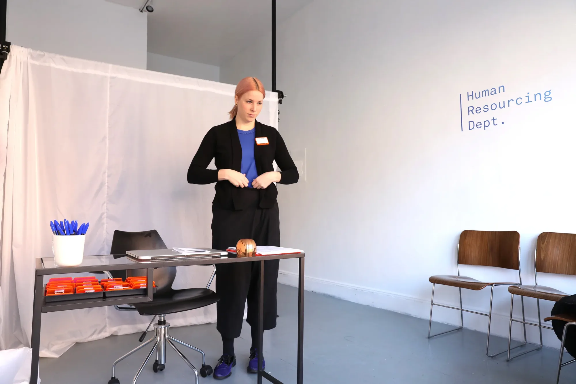 Ellen prepares for another day spent helping displaced workers in 2088