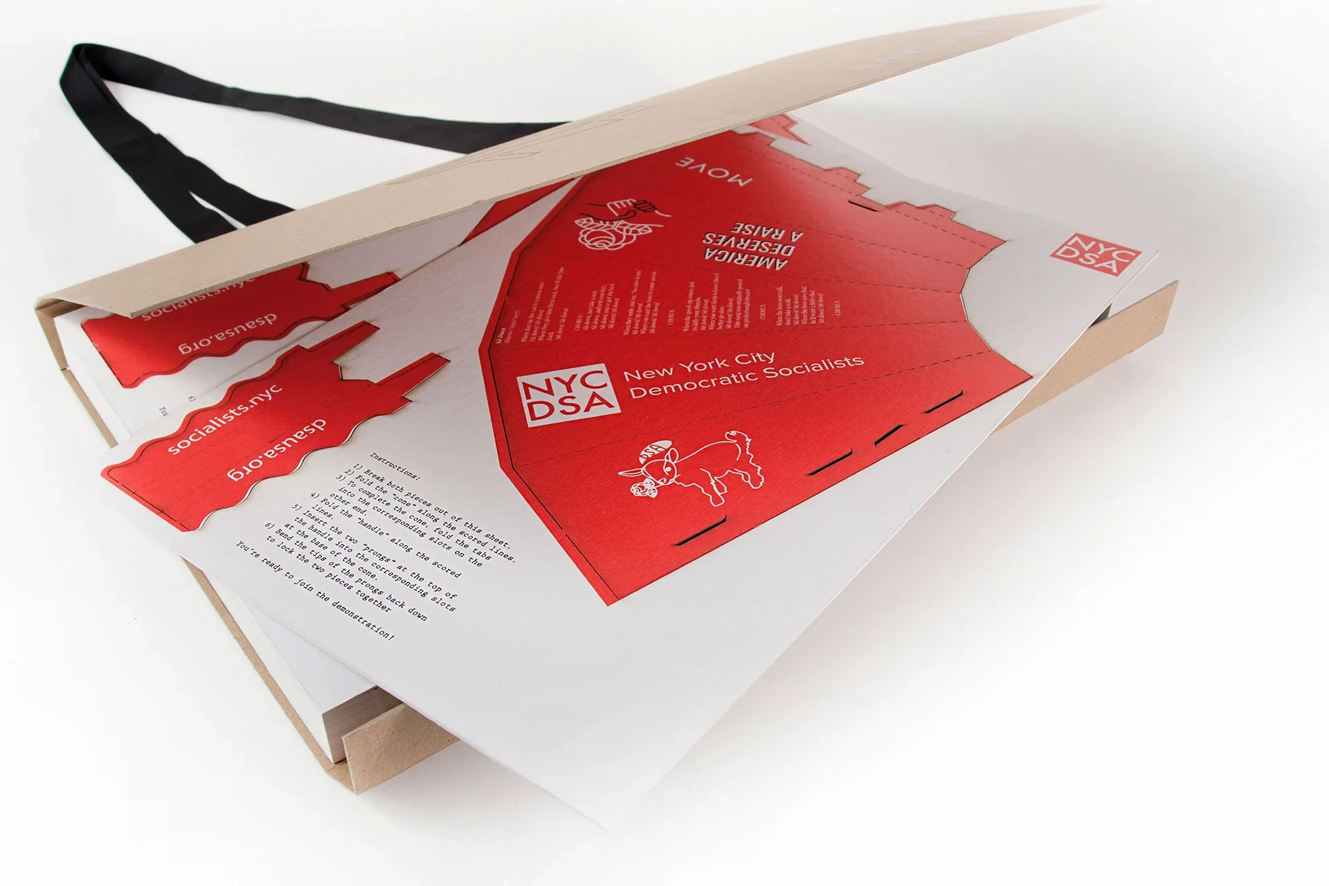 A flat-pack MOVE sign, half-unfolded and detached from its megaphone form