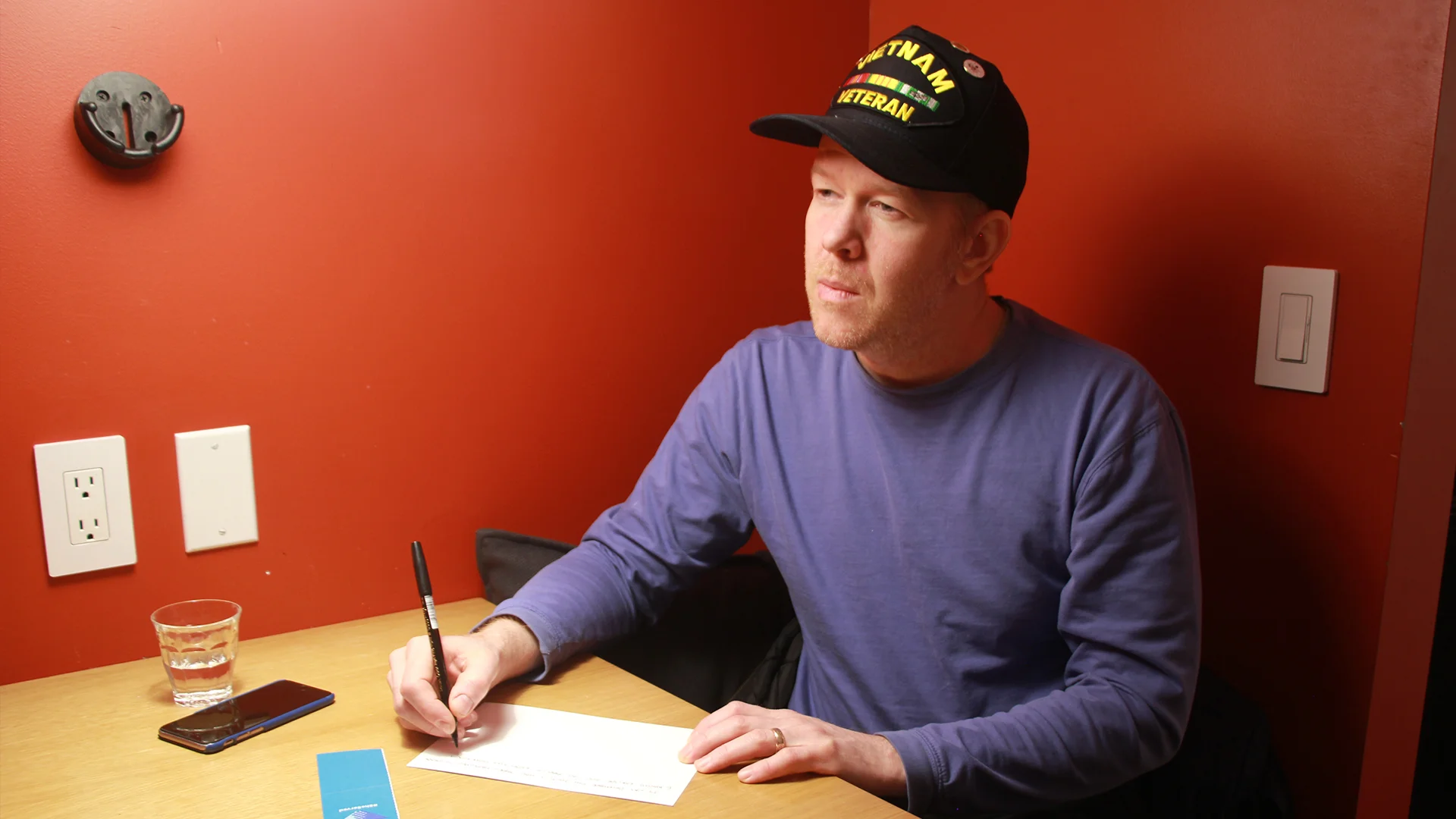 Vets hand-write their stories on the blank back and mail in pre-paid postcards for curation and aggregation.